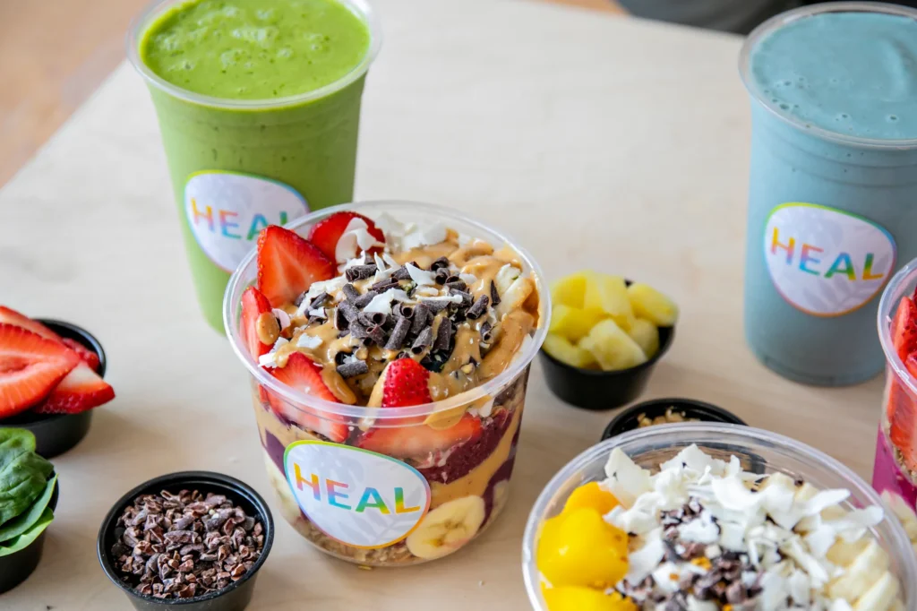 Fresh HEAL Wellness smoothie bowl with fruit toppings